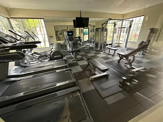 a view of a room with gym equipment