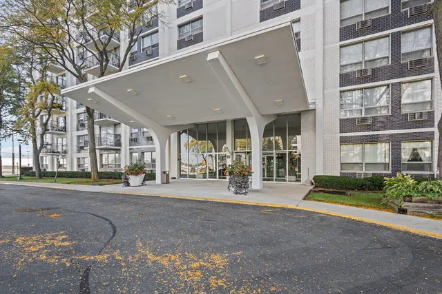 a front view of a building with street view