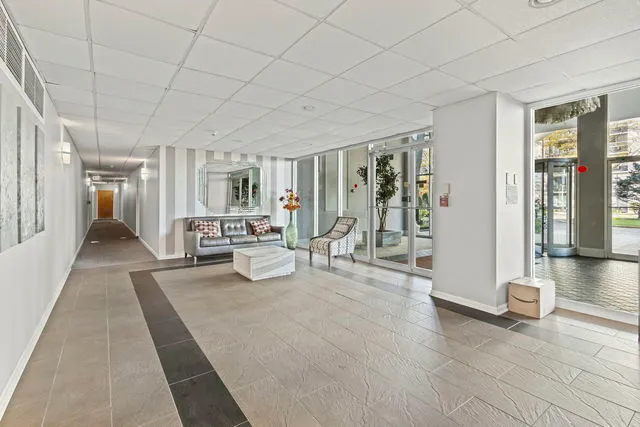 a view of a livingroom with furniture and door