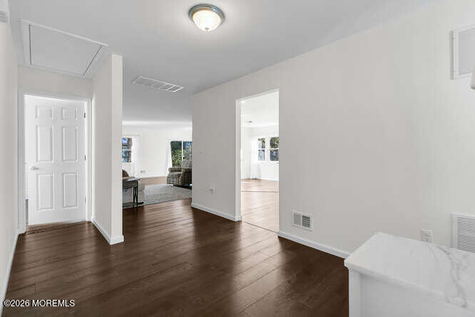8 Carter Way Brick, NJ 08723 - Photo 2 of 27 a view of a livingroom with wooden floor