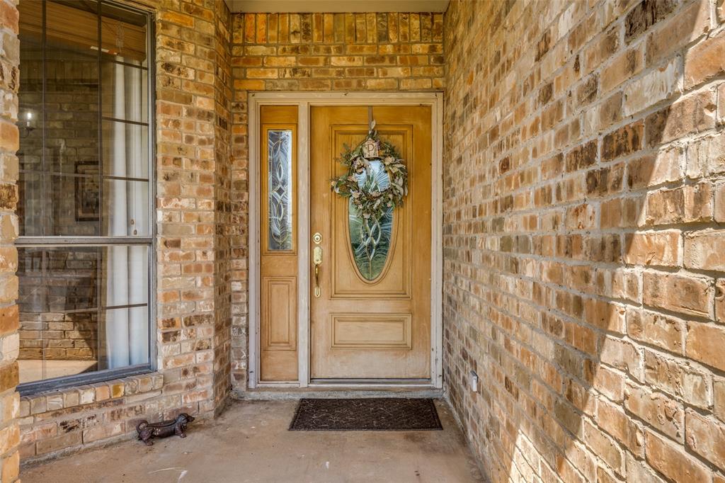 778 County Road 3141 Decatur, TX 76234 - Photo 4 of 25 a front view of a house with a door
