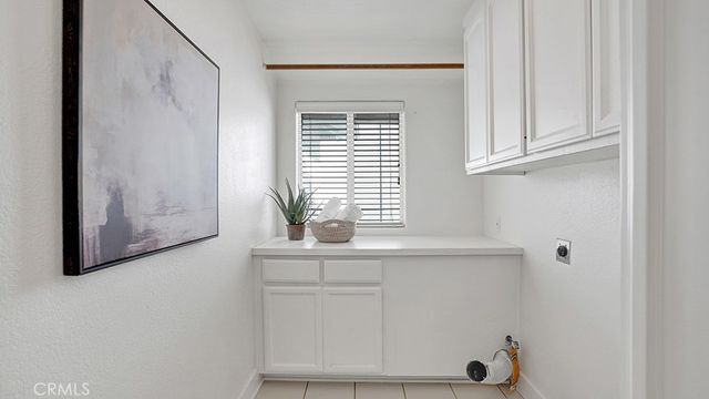 a view of cabinets and window