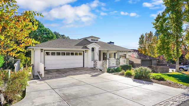 a view of a balcony with chairs
