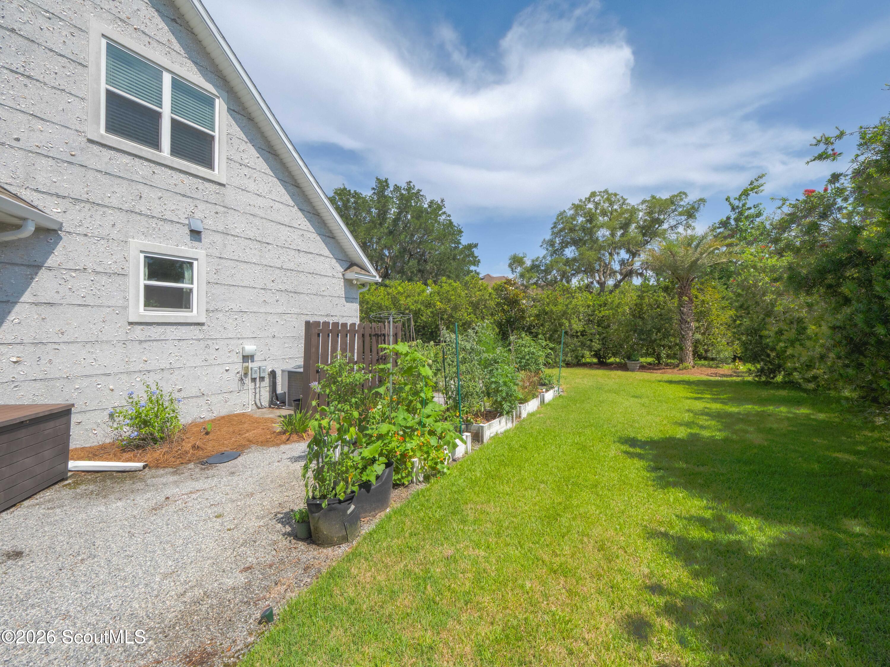 79 Manatee Court Waverly, GA 31565 - Photo 50 of 56 Garden area in the backyard