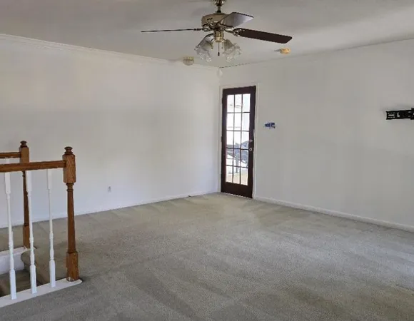 a view of a room with fan