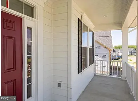 a view of a balcony with lake view