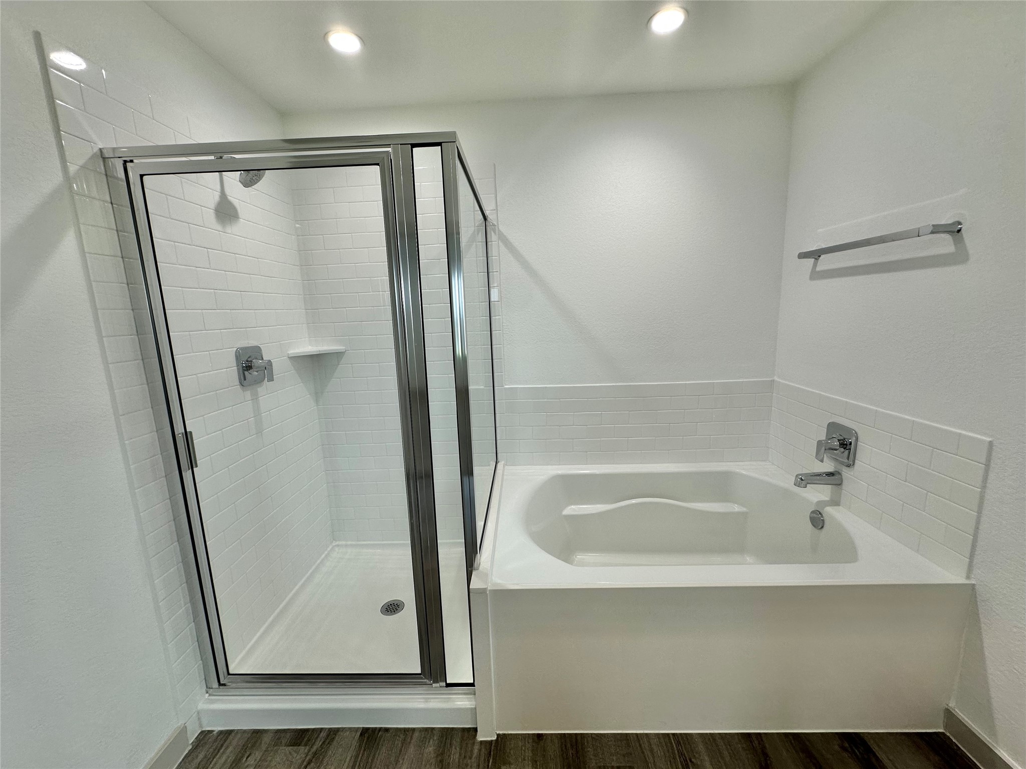 1107 Curly Angora Court Rosharon, TX 77583 - Photo 33 of 42 a bathroom with a bathtub and a shower