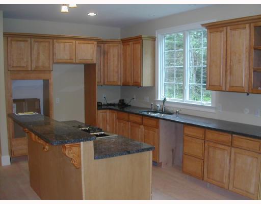 489 Fletcher Road North Kingstown, RI 02852 - Photo 5 of 8 Kitchen. Kitchen View with Maple Cabinets and Granite Countertops. Stainless Steel Appliances soon to be installed.