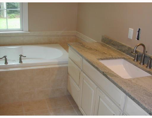 489 Fletcher Road North Kingstown, RI 02852 - Photo 7 of 8 Master Bath/Spa. Master Bath includes granite, tiled shower, whirlpool, and private room for commode.