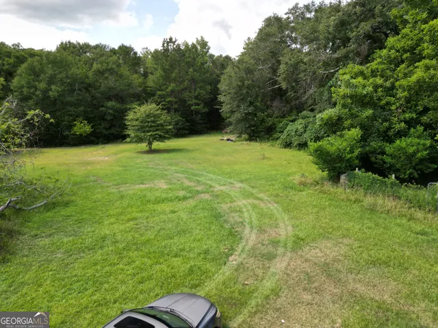 a view of a green yard