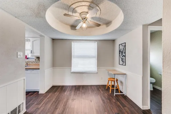 wooden floor in a room with a window and wooden floor
