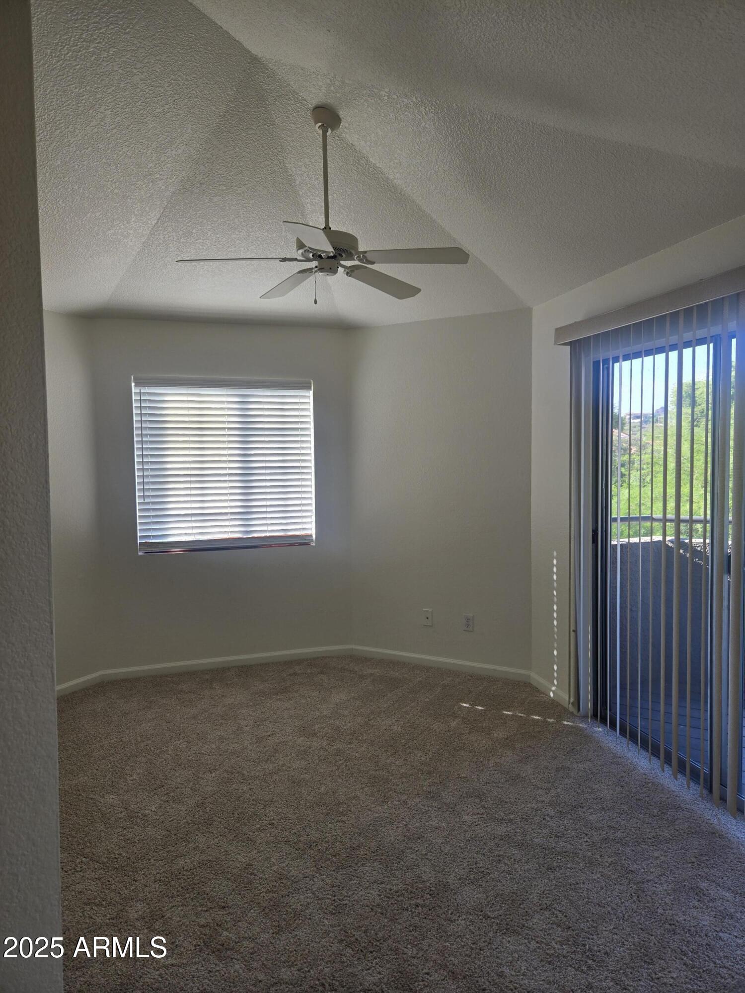 1720 East Thunderbird Road, Unit 2094 Phoenix, AZ 85022 - Photo 11 of 36 a view of an empty room with a window