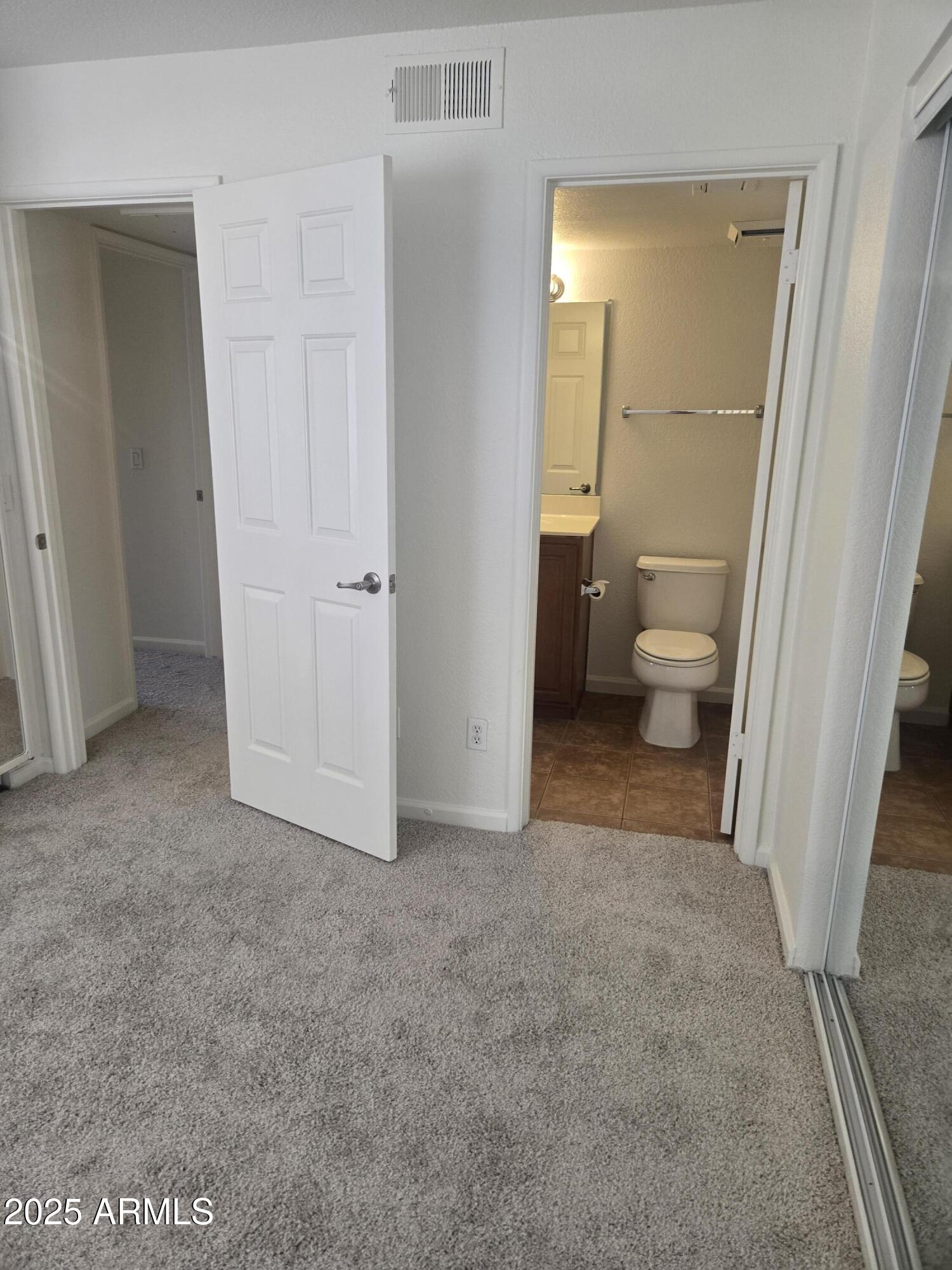 1720 East Thunderbird Road, Unit 2094 Phoenix, AZ 85022 - Photo 20 of 36 a view of a bathroom with a sink and a mirror