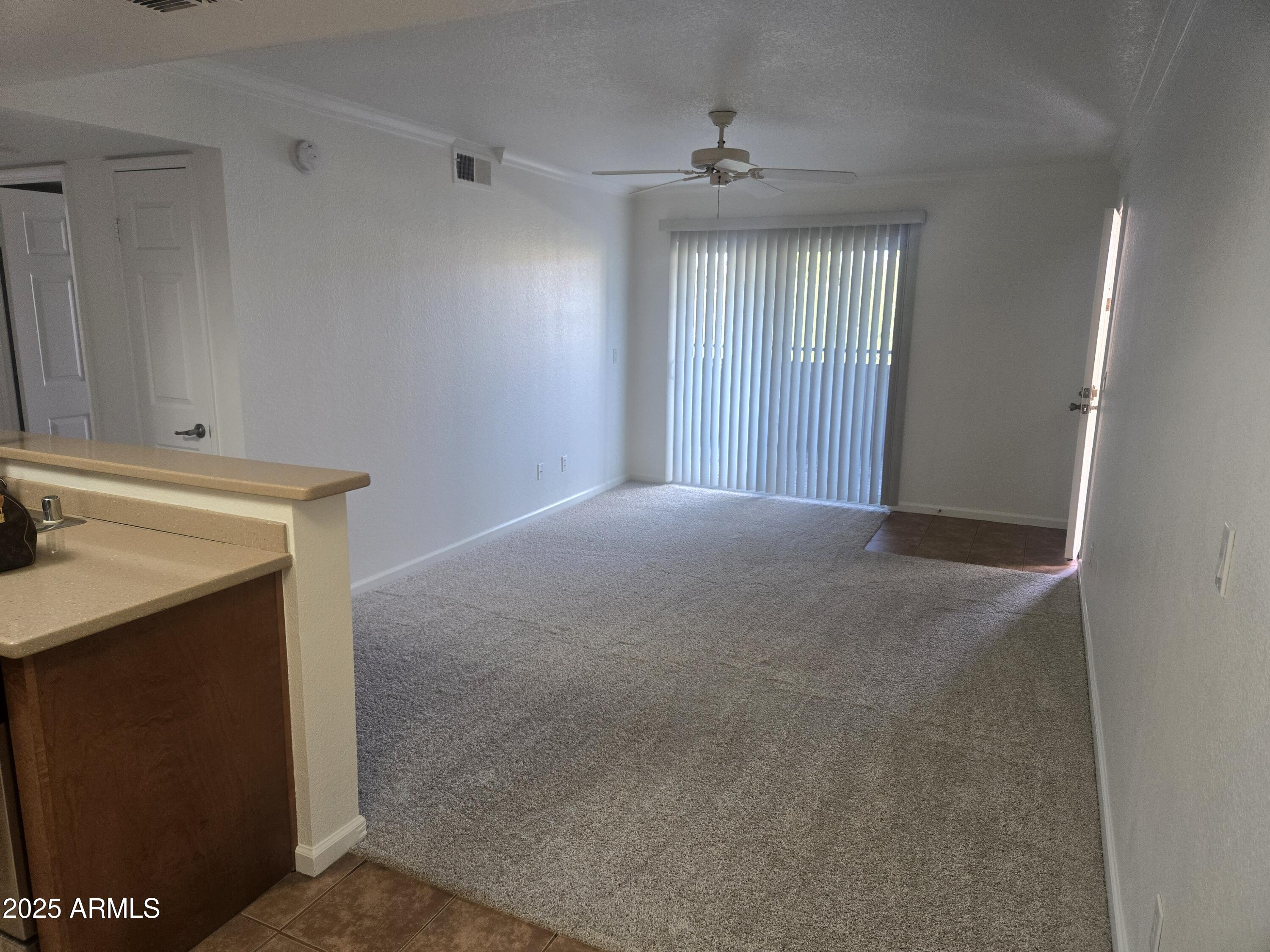 1720 East Thunderbird Road, Unit 2094 Phoenix, AZ 85022 - Photo 3 of 36 a view of empty room with windows