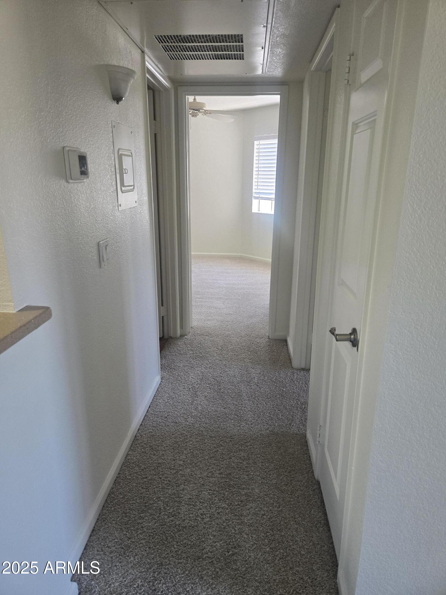 1720 East Thunderbird Road, Unit 2094 Phoenix, AZ 85022 - Photo 7 of 36 a view of hallway with closet