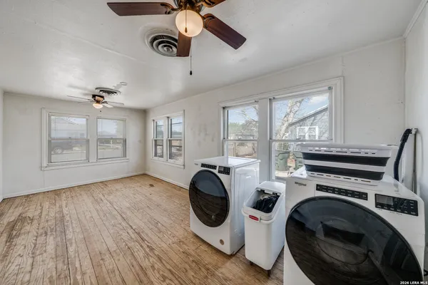 a view of a storage & utility room with washer and dryer