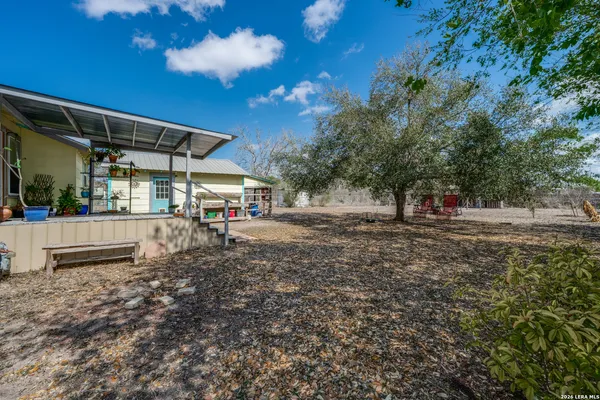 a view of outdoor space with deck and tree