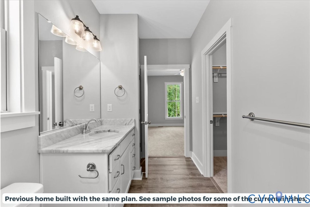 5386 Mountain Creek Road Green Bay, VA 23942 - Photo 18 of 27 a bathroom with a sink mirror and vanity
