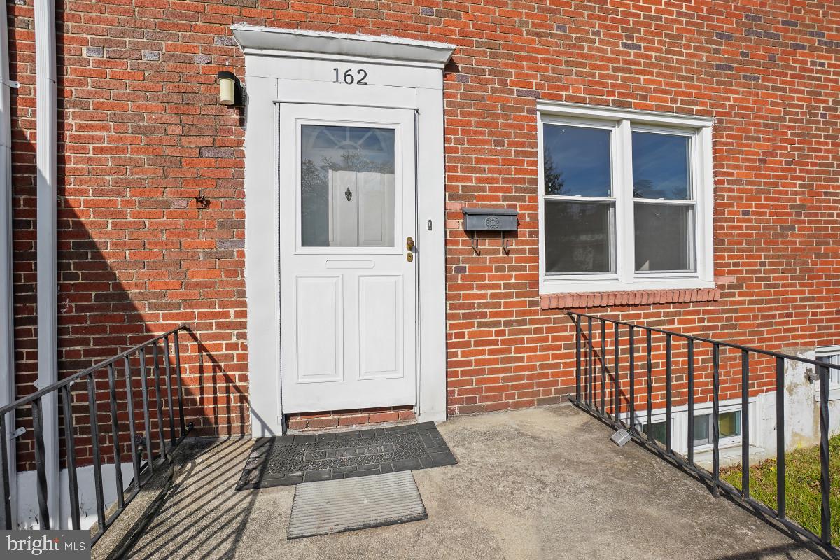 162 Cherrydell Road Baltimore, MD 21228 - Photo 2 of 31 Charming entrance with classic brickwork.