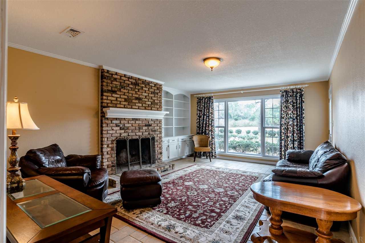 8834 Burning Tree Road Pensacola, FL 32514 - Photo 22 of 50 Warm fireplace for those cold winter nights