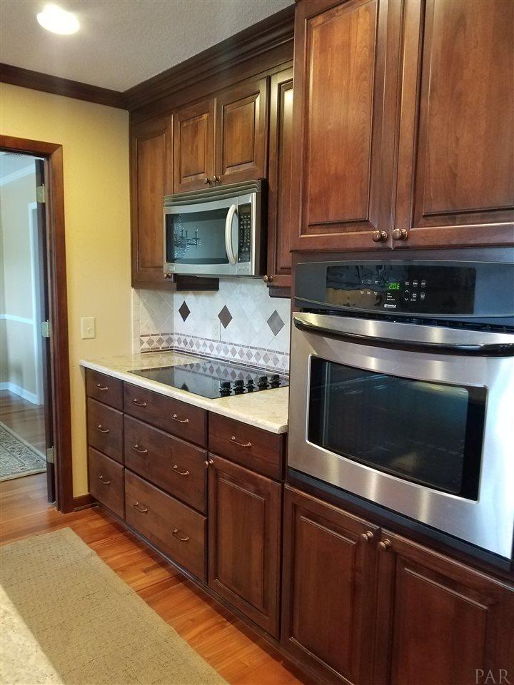 8834 Burning Tree Road Pensacola, FL 32514 - Photo 9 of 50 Oven and cooktop replaced in remodel