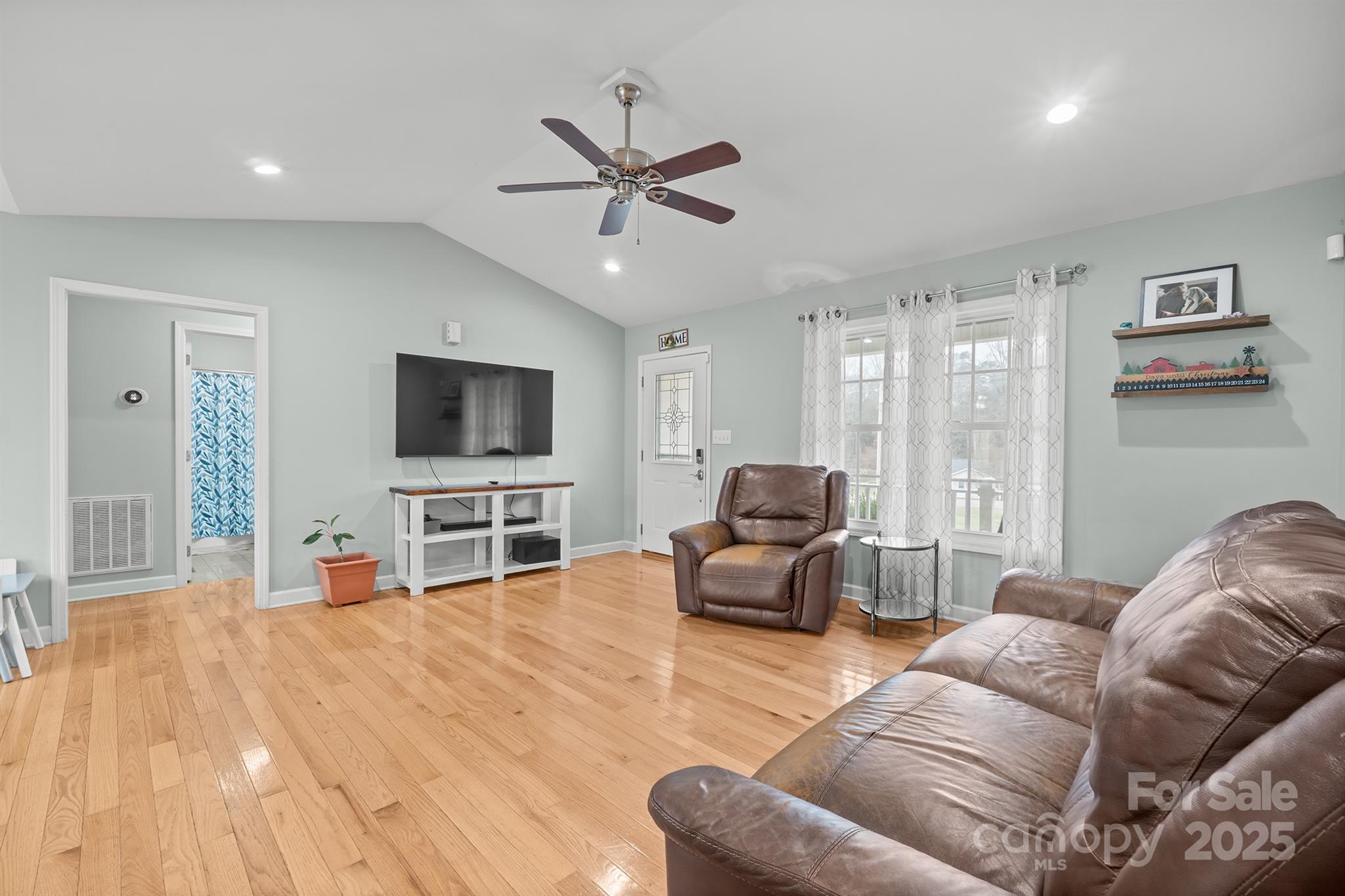 2572 Rock Dam Road Lincolnton, NC 28092 - Photo 11 of 30 a living room with furniture and a flat screen tv