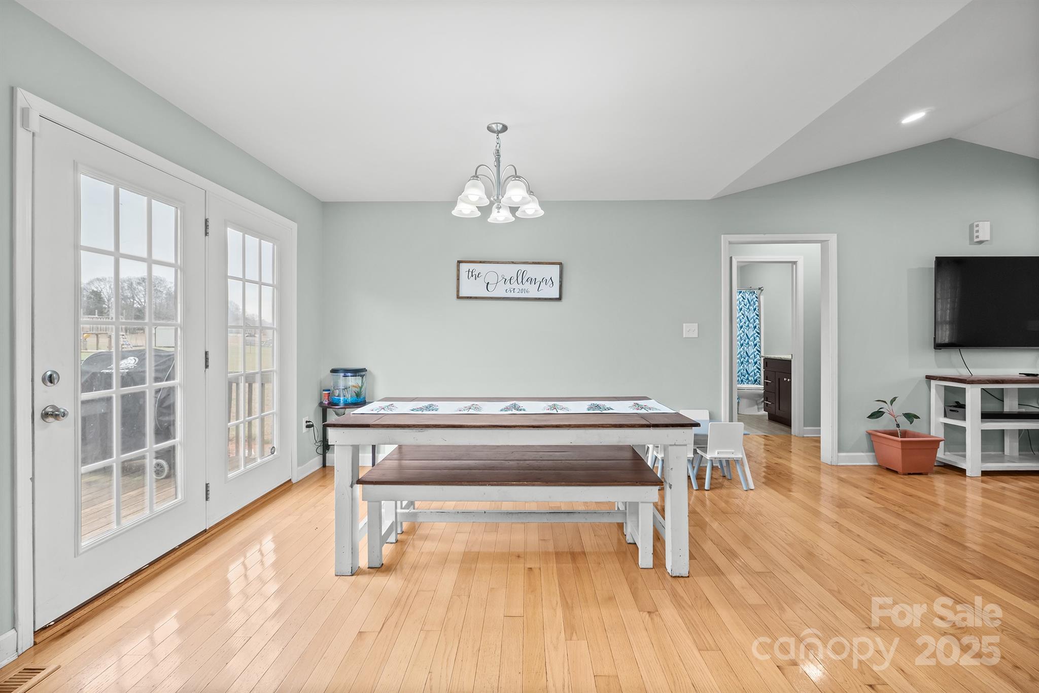 2572 Rock Dam Road Lincolnton, NC 28092 - Photo 14 of 30 a living room with a flat screen tv and a wooden floor