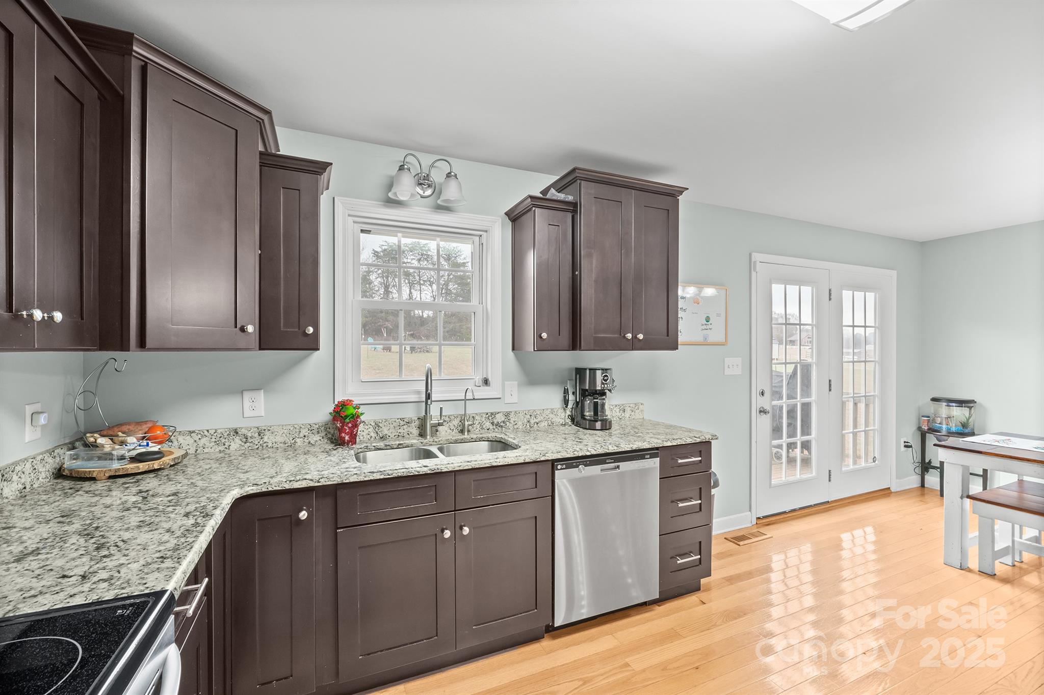 2572 Rock Dam Road Lincolnton, NC 28092 - Photo 18 of 30 a bathroom with a granite countertop sink double vanity and a mirror