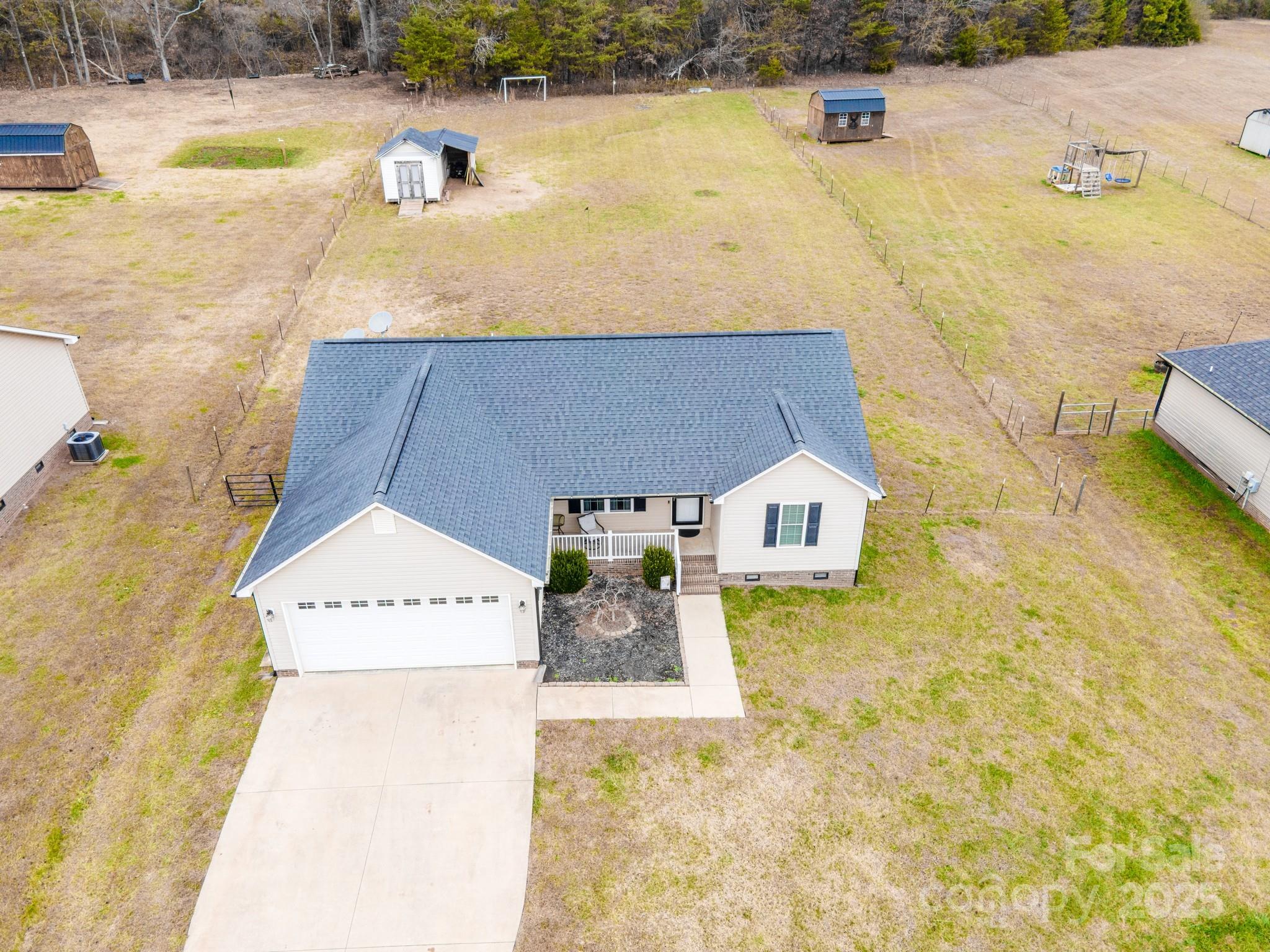 2572 Rock Dam Road Lincolnton, NC 28092 - Photo 3 of 30 a view of a swimming pool with an outdoor space