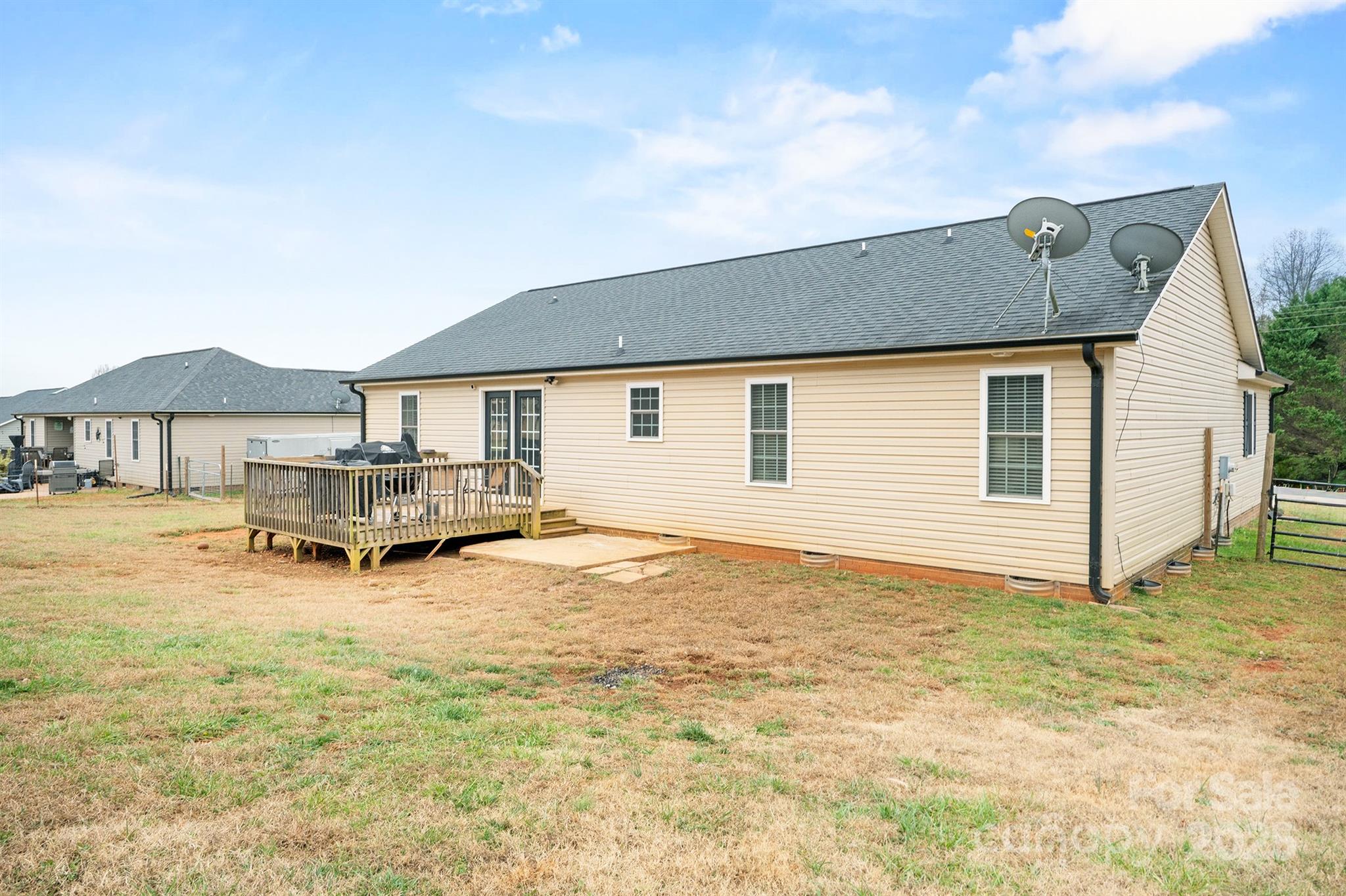 2572 Rock Dam Road Lincolnton, NC 28092 - Photo 4 of 30 a house that has a sitting area in front of it