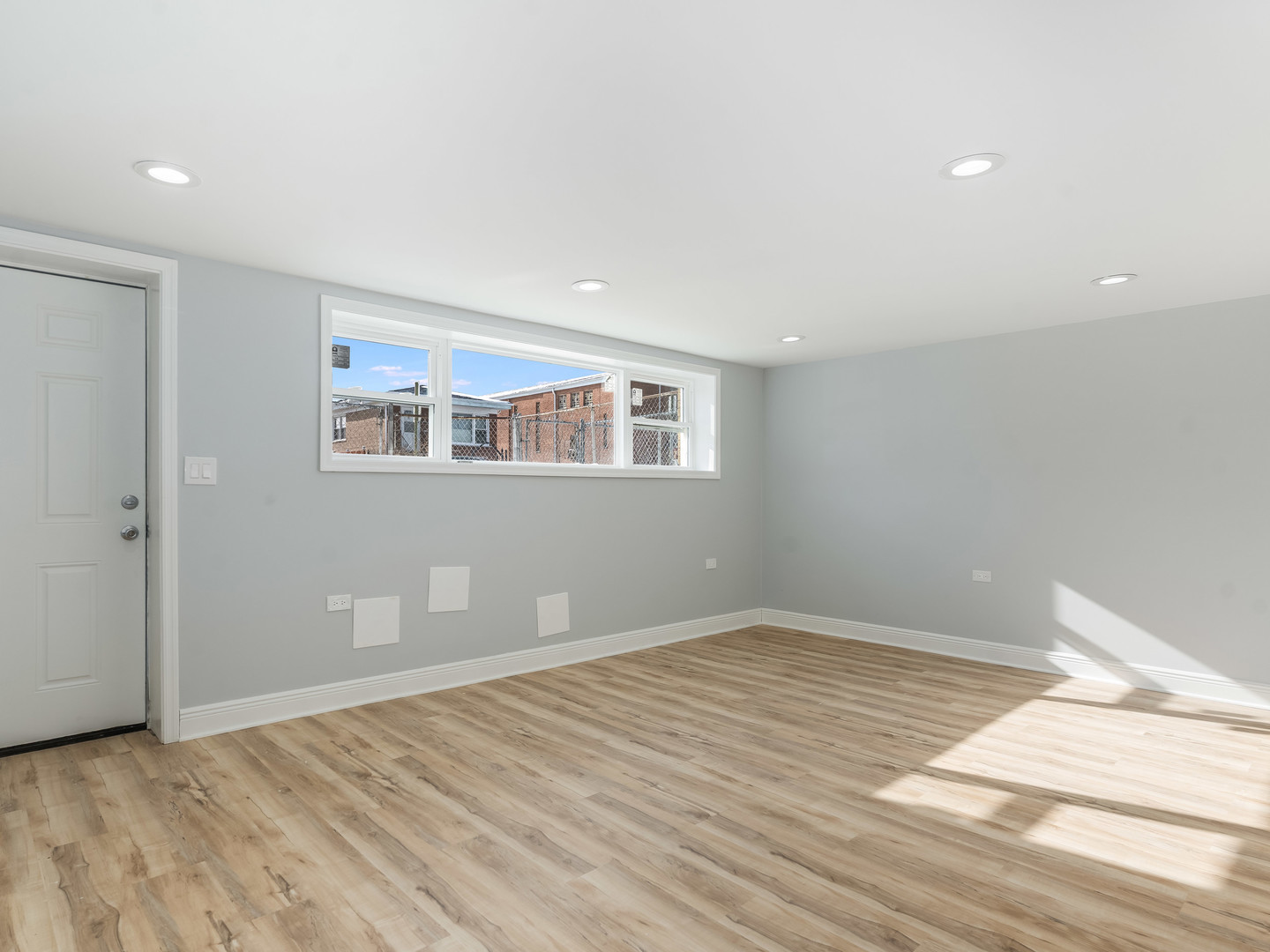 7502 64th Street Summit, IL 60501 - Photo 19 of 31 a view of a room with wooden floor and white walls