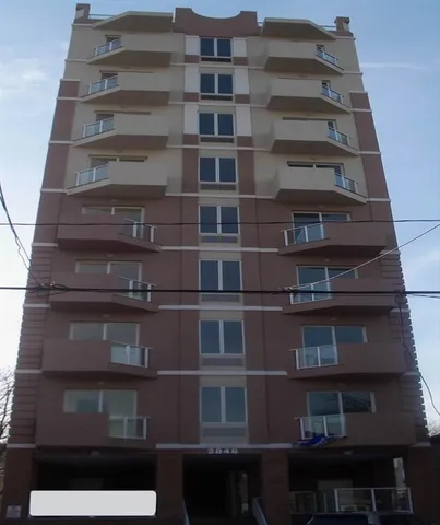 a view of a city with tall buildings