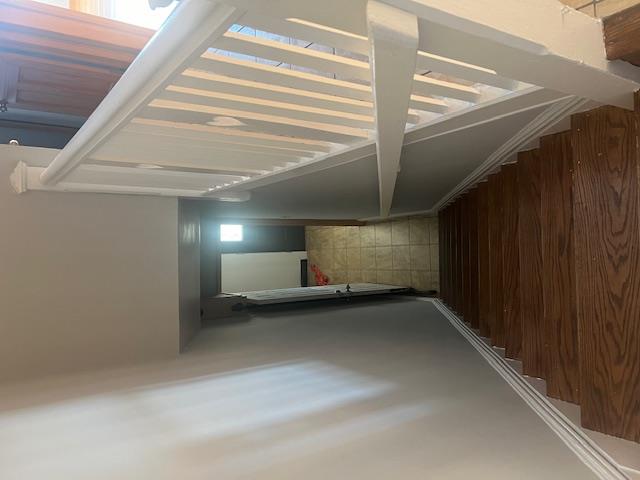 88-40 88th Street Queens, NY 11421 - Photo 11 of 18 Stairway with hardwood / wood-style floors