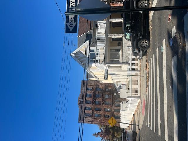 88-40 88th Street Queens, NY 11421 - Photo 5 of 18 View of front of house with a balcony