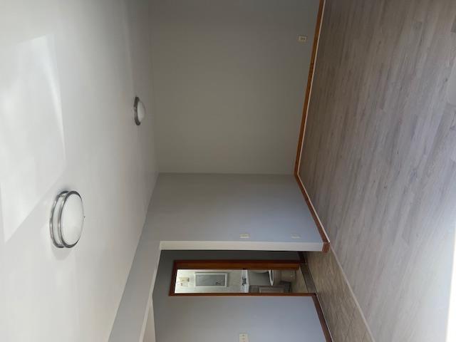 88-40 88th Street Queens, NY 11421 - Photo 9 of 18 Empty room featuring light hardwood / wood-style flooring