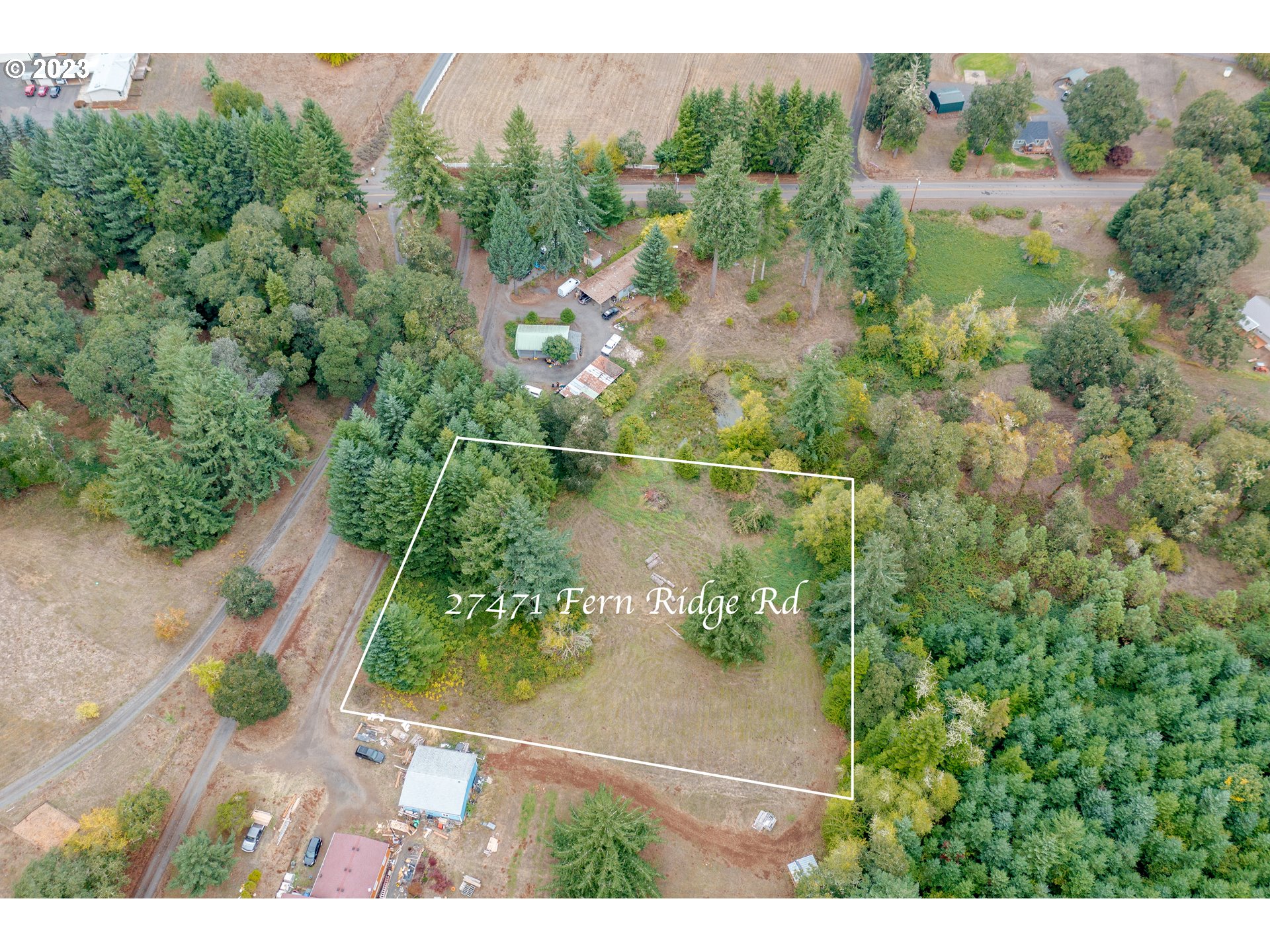 27471 Fern Ridge Road Sweet Home, OR 97386 - Photo 2 of 14 an aerial view of residential houses with outdoor space and trees