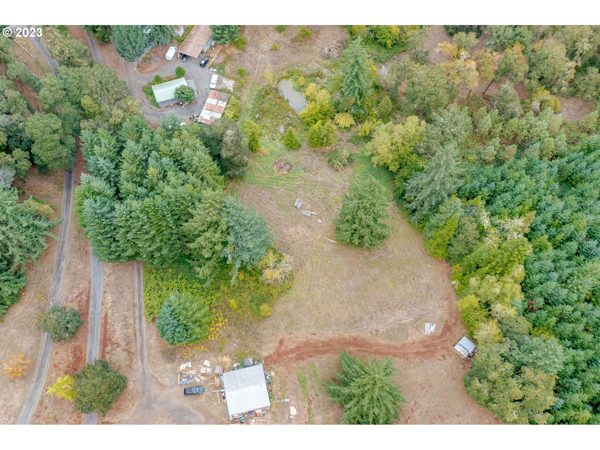27471 Fern Ridge Road Sweet Home, OR 97386 - Photo 4 of 14 an aerial view of a house with a yard