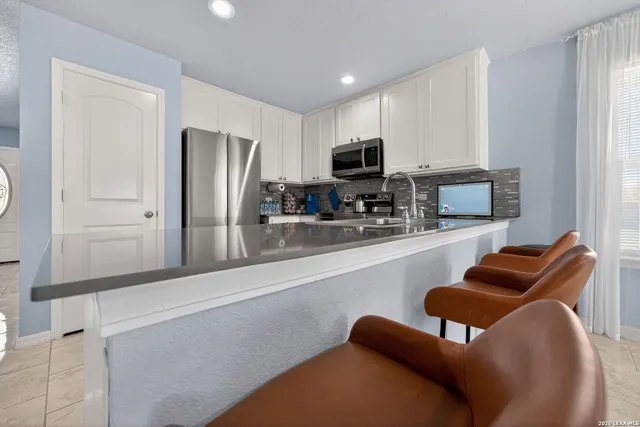 a view of a dining room with furniture