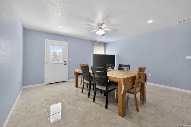 a view of a dining room with furniture