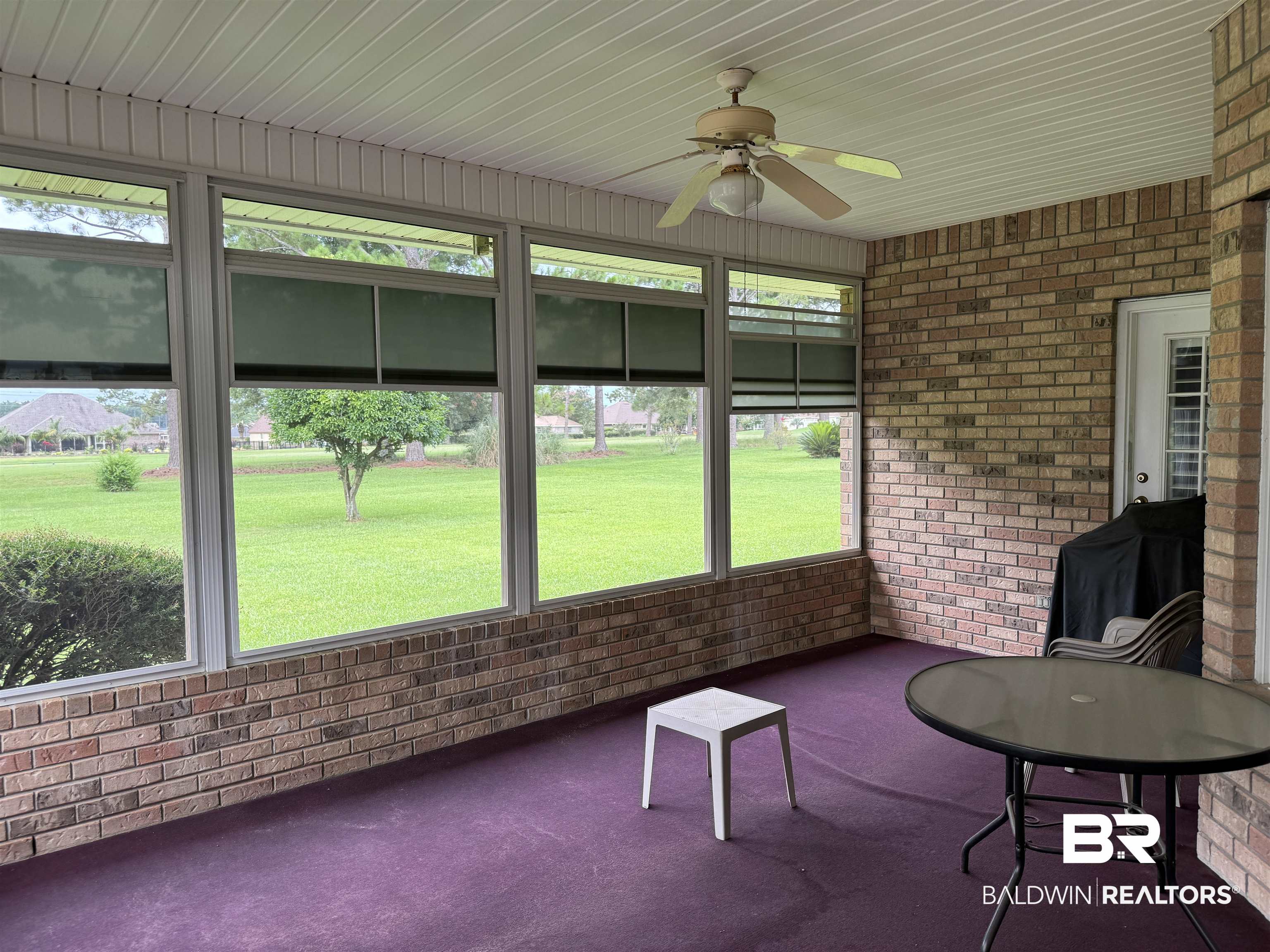 9139 Clubhouse Drive Foley, AL 36535 - Photo 28 of 30 Unfurnished sunroom with a wealth of natural light, ceiling fan, and wood ceiling