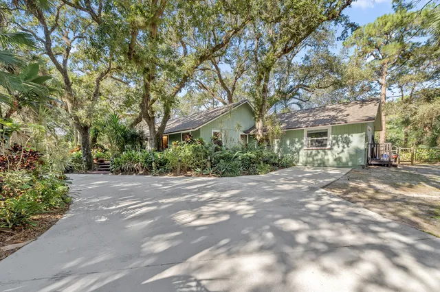 a view of a house with a street