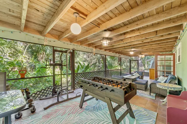 a outdoor space with lots of furniture and garden view