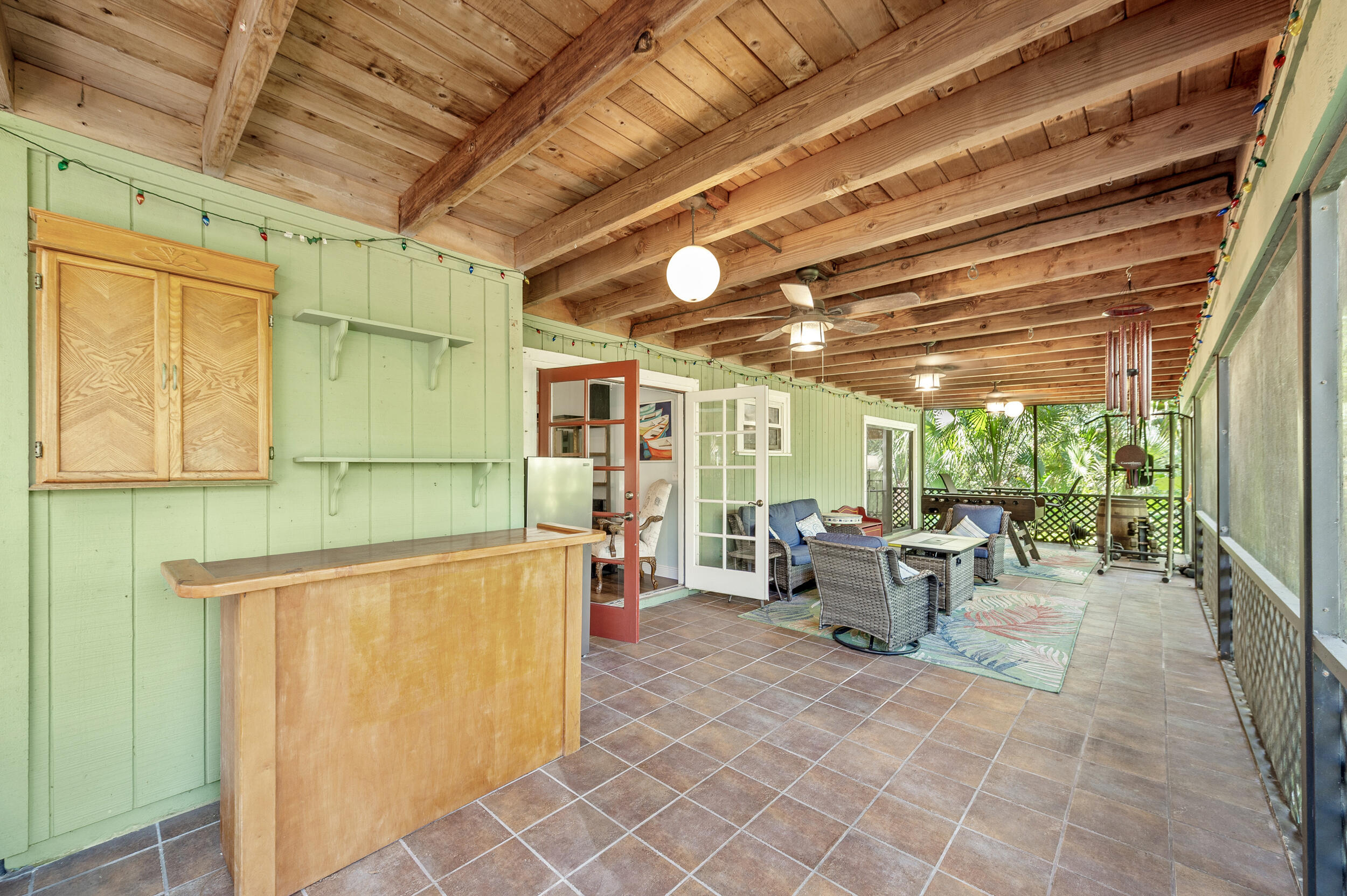9207 166th Way North Jupiter, FL 33478 - Photo 14 of 34 Screened Porch Bar Area