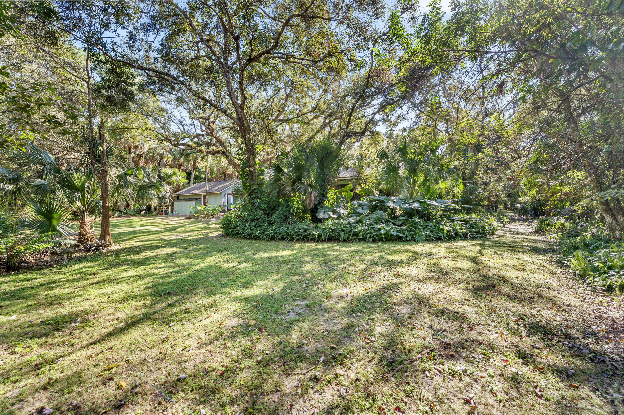 9207 166th Way North Jupiter, FL 33478 - Photo 32 of 34 Yard bordered by Riverbend