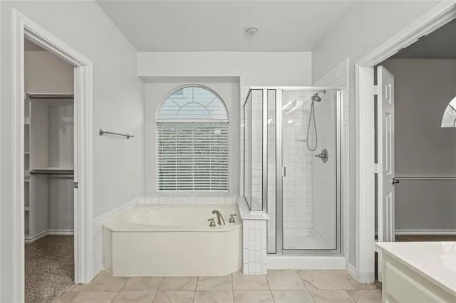 a view of storage and utility room with racks on the wall