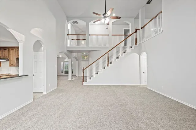 a view of entryway and hall with a chandelier