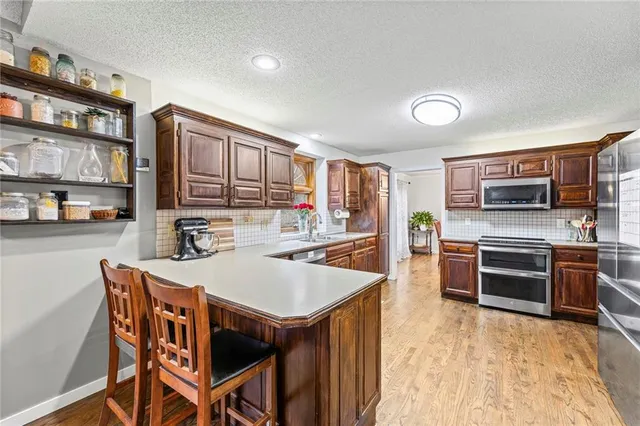 $345,000 | 1300 Northwest Timber Oak Drive, Blue Springs, MO 64015