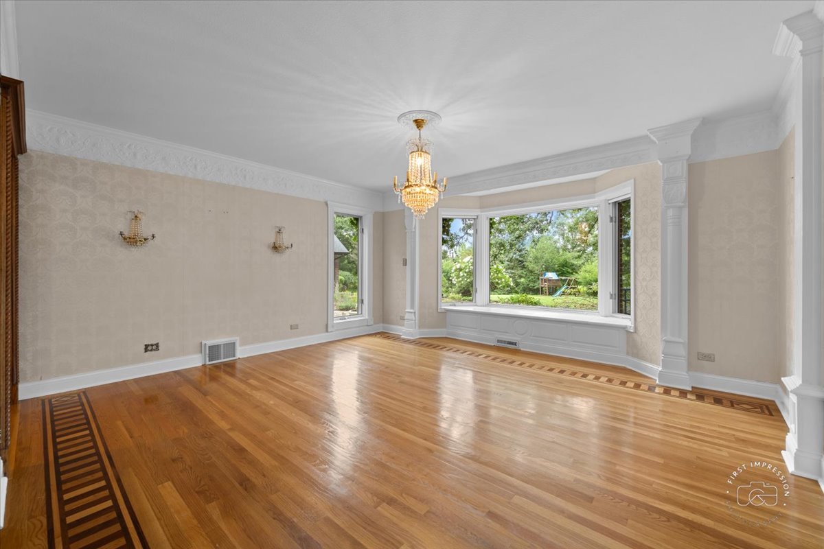 27158 West Cuba Road Barrington, IL 60010 - Photo 11 of 51 wooden floor in an empty room with a window