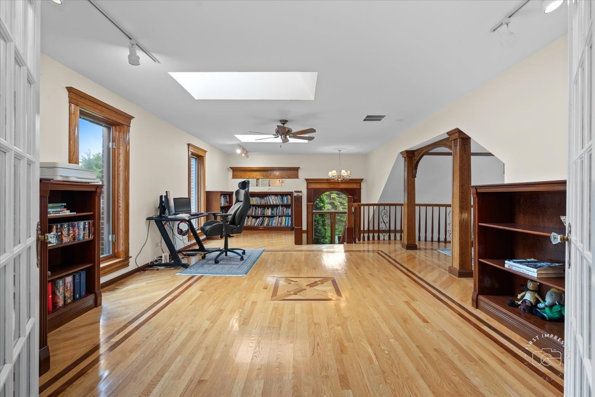 27158 West Cuba Road Barrington, IL 60010 - Photo 24 of 51 a view of a entryway with furniture and floor to ceiling window