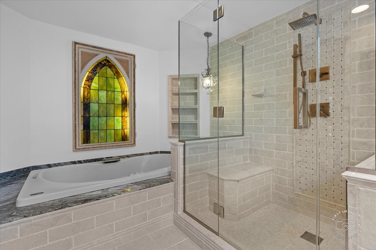 27158 West Cuba Road Barrington, IL 60010 - Photo 29 of 51 a bathroom with a bathtub and a shower